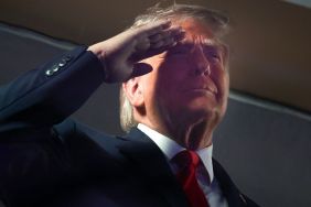 Donald Trump’s National Anthem Salute Sparks Questions About Flag Code Rules