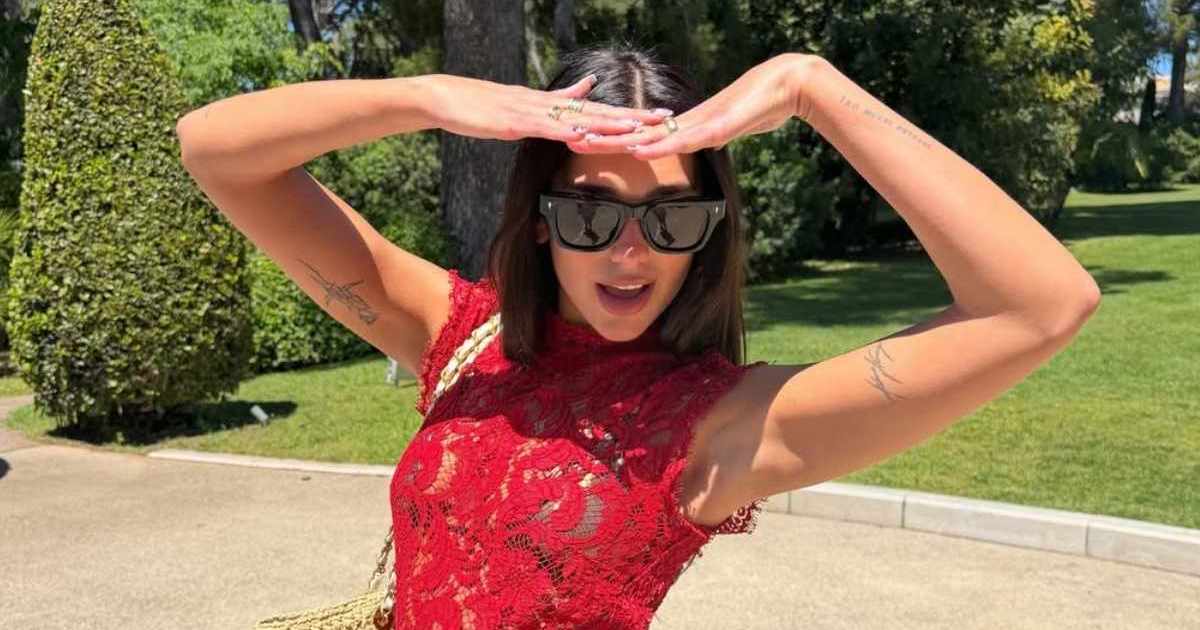 Dua Lipa's Fully See-Through Lace Dress Features a Dangerously High Slit