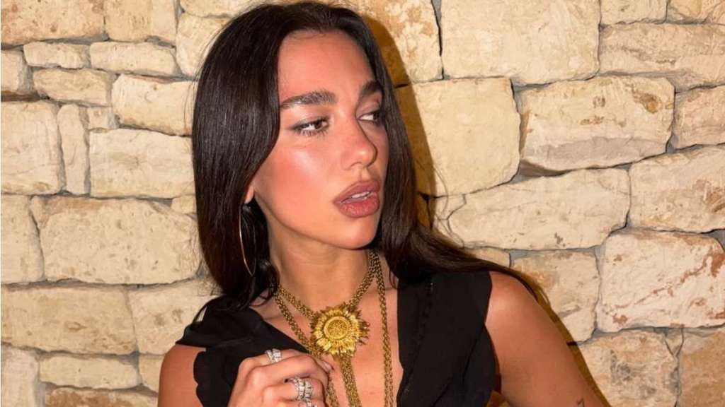 Dua Lipa's $545 Roberto Cavalli String Bikini Puts Her Abs Front & Center