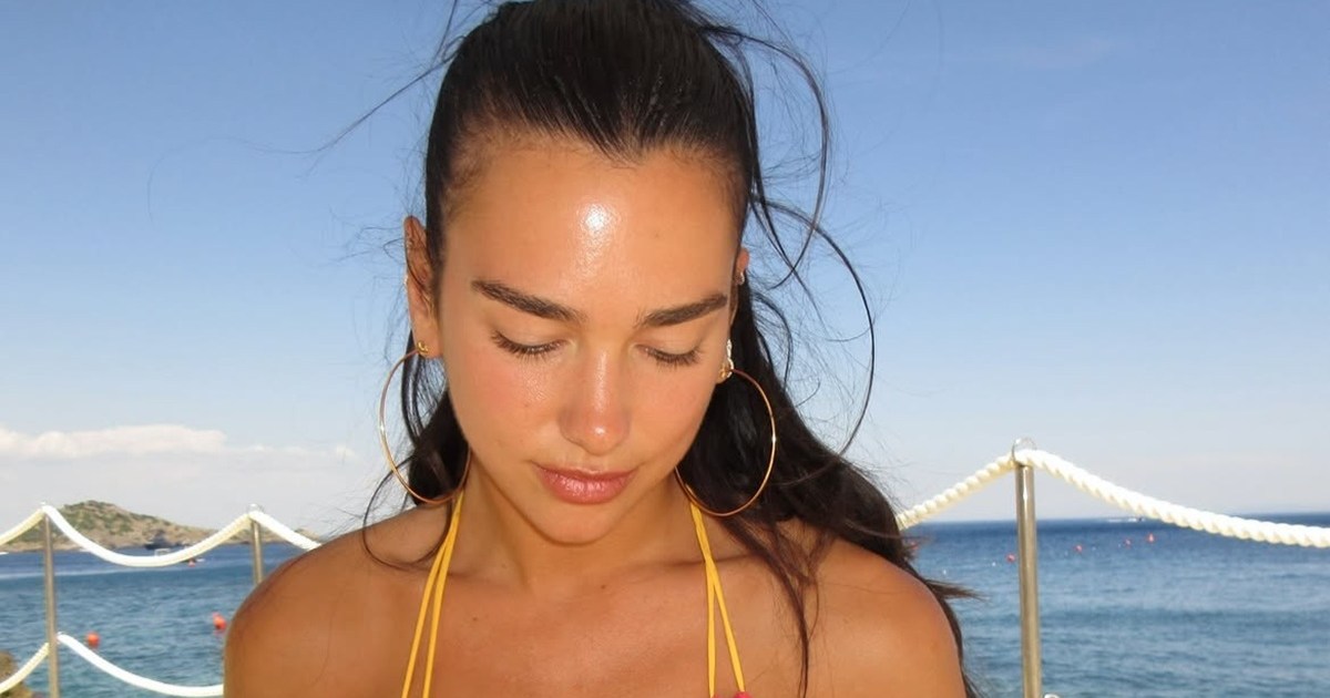 Dua Lipa's String-Tied Bikini Makes a Bold Splash in New Beach Photos