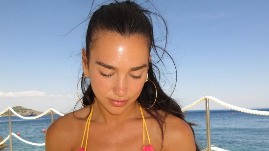 Dua Lipa's String-Tied Bikini Makes a Bold Splash in New Beach Photos