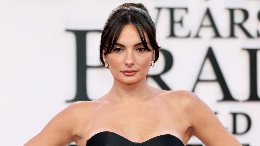 Paige DeSorbo’s Revealing Top Barely Contains Her Curves in New Photos
