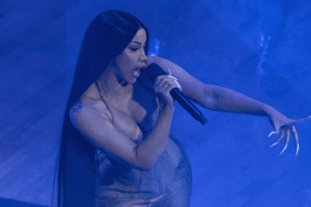Cardi B Gives Plunging Latex Top Hanging by a String a Chanel Upgrade