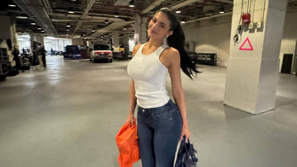 Kylie Jenner's Plunging Top Dips Dangerously Low for Knicks Game