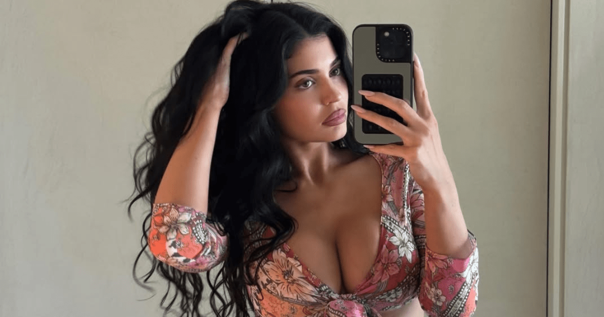 Kylie Jenner Takes on Yacht Pilates in Alo Sports Bra & Micro Shorts