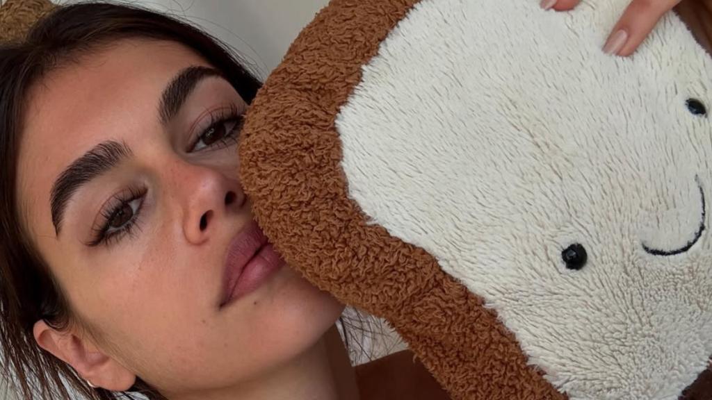 Kaia Gerber’s Lacy DOEN Micro Minidress Is Boldly See-Through the Right Way