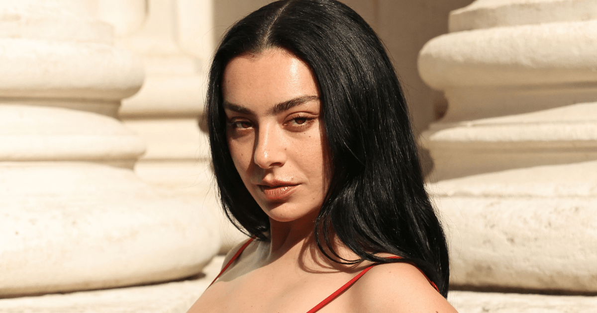 Charli XCX Tops off $10K See-Through Dress Look With YSL Pouch & Pumps
