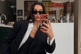 Dua Lipa’s See-Through Ann Demeulemeester Cardigan Reveals Lacy Chloe Top