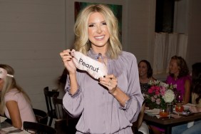 Lindsie Chrisley holding up an eye mask that says "peanut"