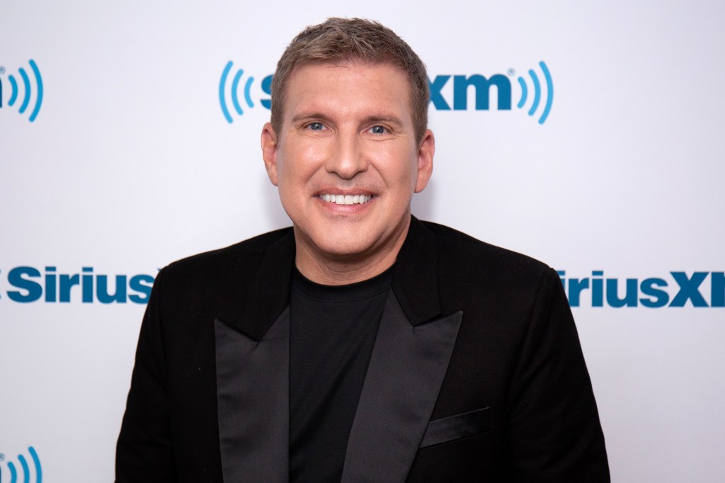 Todd Chrisley in a black suit at SiriusXM studios