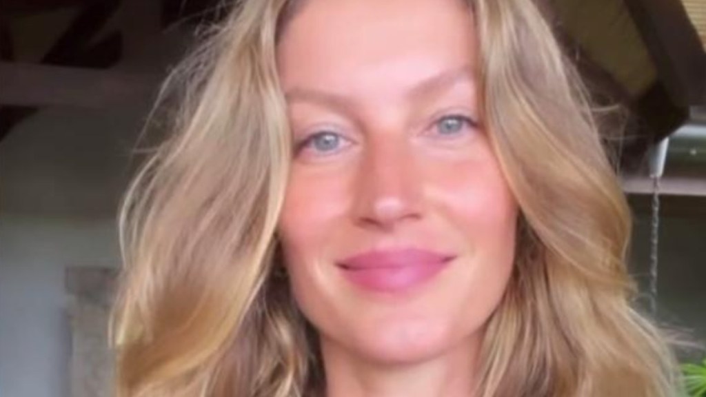 Gisele Bundchen Strips Down for a Bold Open Coat Look That Commands Attention