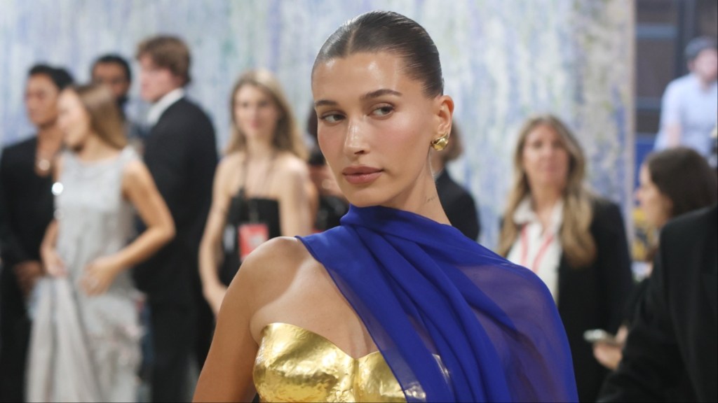 Hailey Bieber plunging top straps