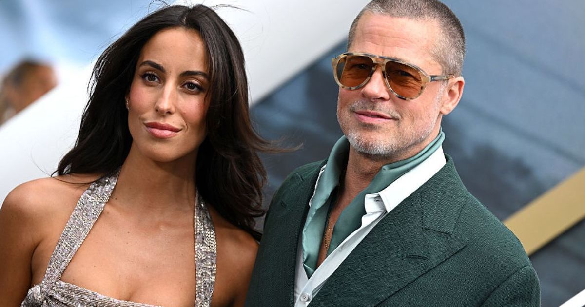 Brad Pitt’s Girlfriend Draws Eyes in Leather Coat With Daring Slit