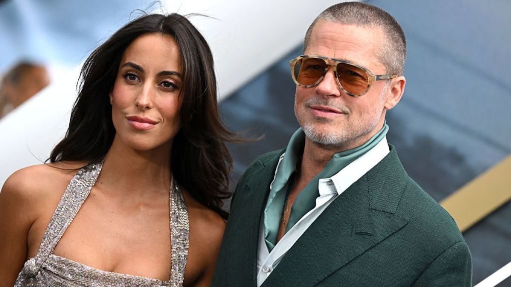 Brad Pitt's Girlfriend Draws Eyes in Leather Coat With Daring Slit