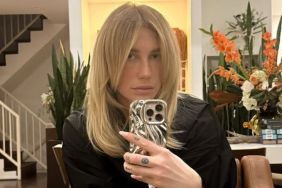 Kesha Spreads Her Legs on Stage in Bodysuit That Shows off Her Thighs
