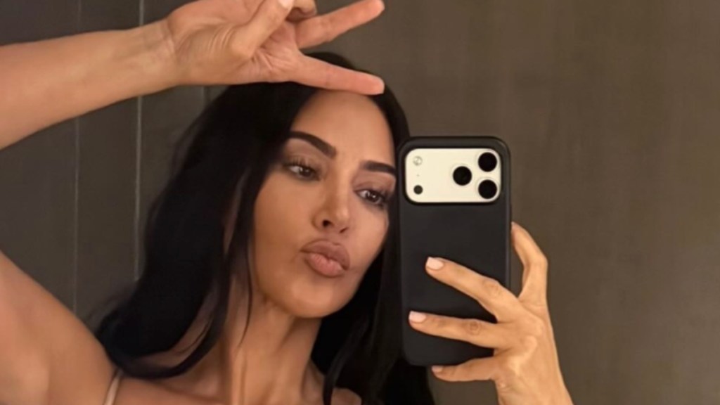 Kim Kardashian Shows off More Than Just Curves in a Tiny Bra Top & Shorts