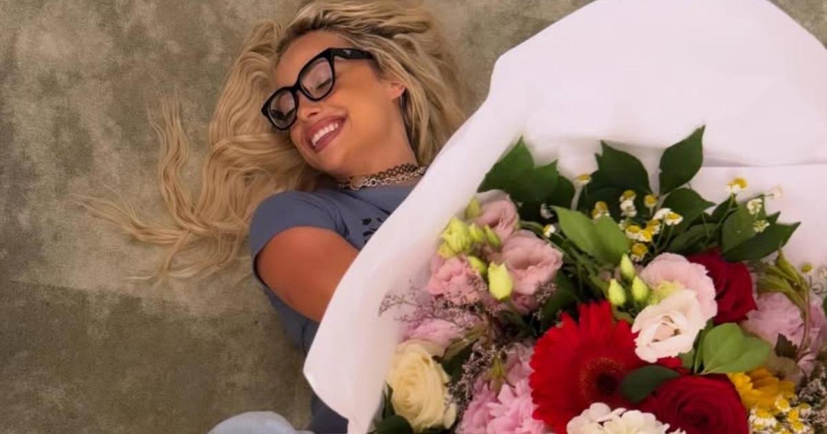 Liv Morgan Cuts Birthday Cake in Ripped Bra Top