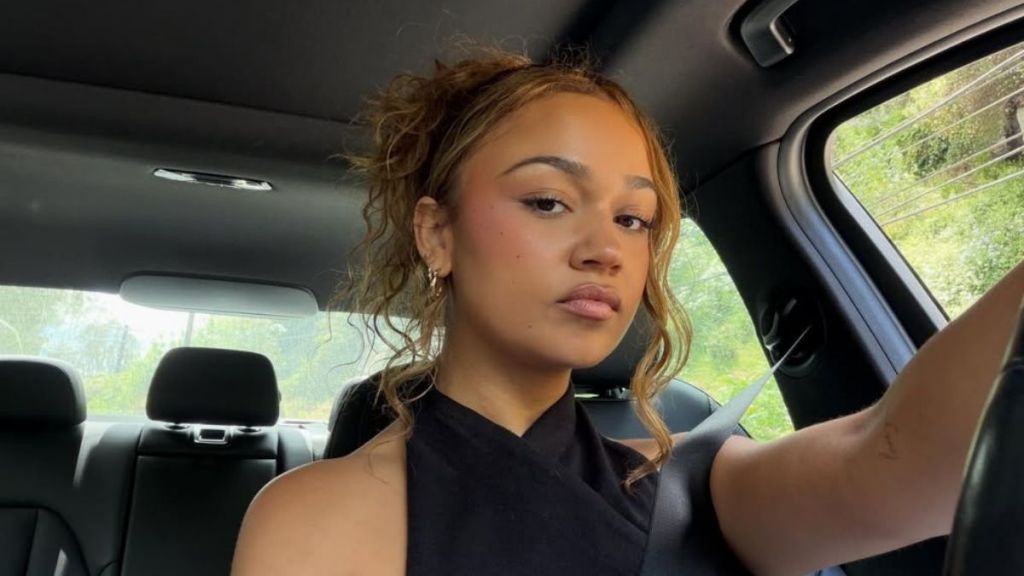 Madison Bailey’s Plunging Crop-Top Almost Gives Everything Away