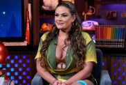 Brittany Cartwright in a green dress on Watch What Happens Live