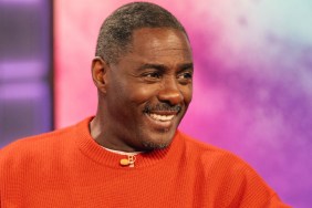 Idris Elba in a red sweater on the Kelly Clarkson Show