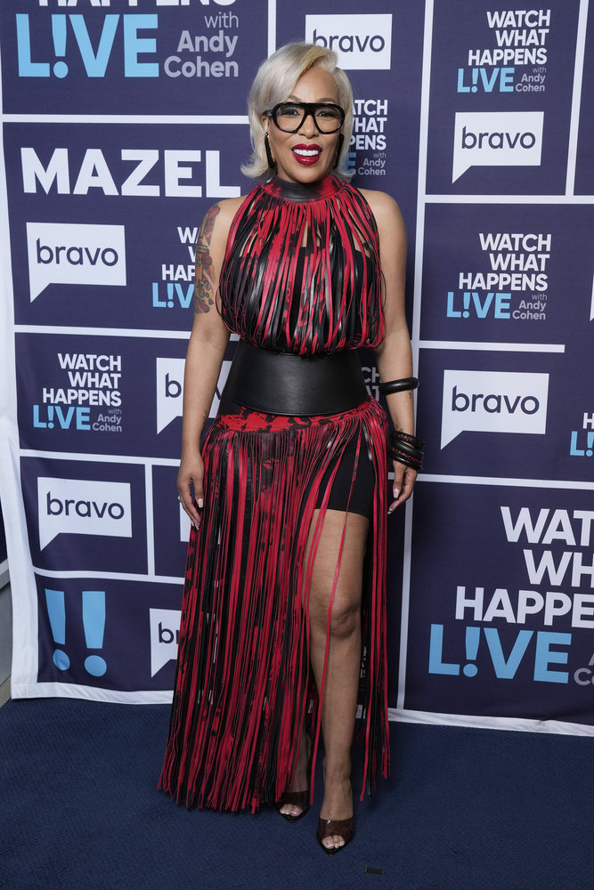 K. Michelle backstage at Watch What Happens Live in a red dress