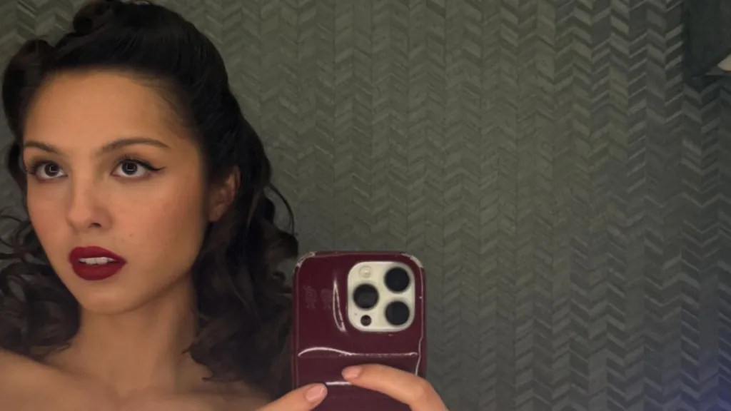 Olivia Rodrigo Flaunts a Flirty Lingerie Moment Under Unbuttoned Jacket