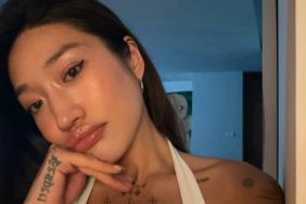 Peggy Gou’s Plunging Top Puts Her Cleavage Tattoos Front & Center