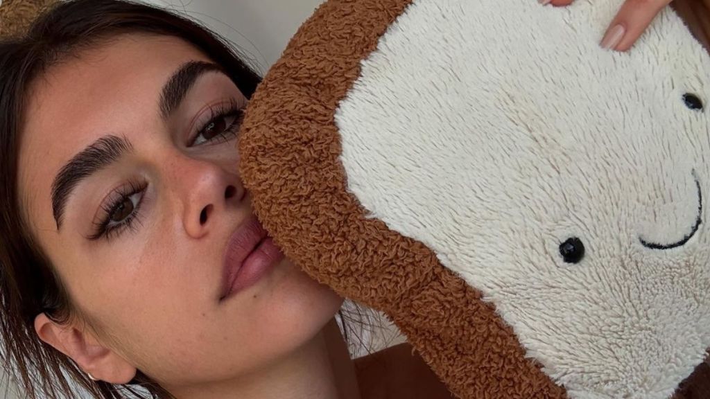 Kaia Gerber Unzips Vuori Jacket To Reveal Cheeky Bralette Over Tiny Shorts
