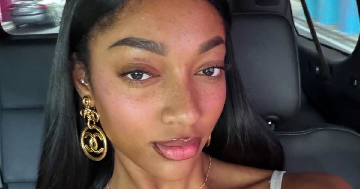 Angel Reese’s Plunging Bra Top Keeps All Eyes on Her Knockout Figure