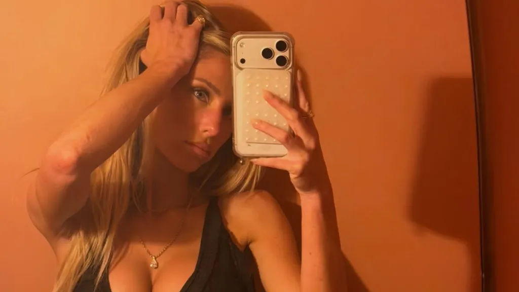 Alix Earle Goes Braless Under Plunging Max Mara Suit That Dips Extra Low