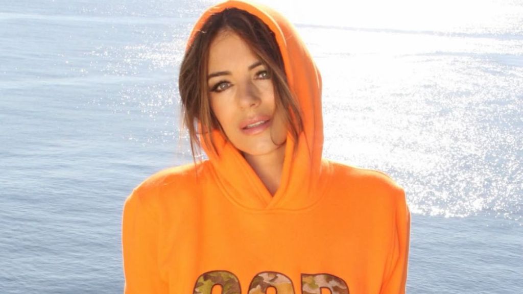 Elizabeth Hurley Goes Pantless in Nothing but Doors of Perception Hoodie