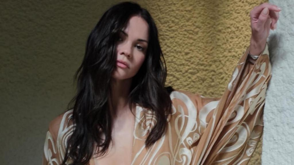 Maia Mitchell’s Deep-Plunge Gown Leaves Little to the Imagination