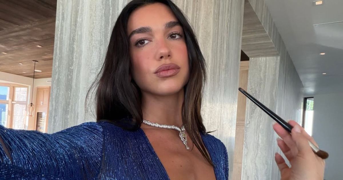 Dua Lipa’s Halter Dress With a Never-Ending Cut Leaves Very Little Covered