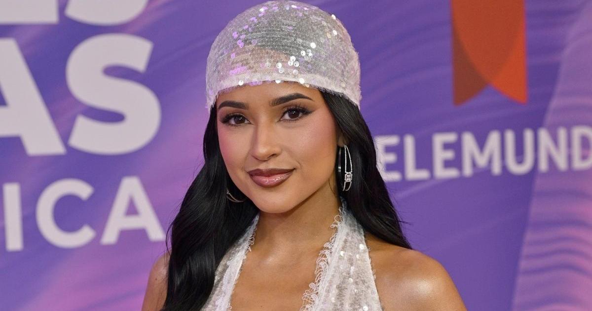 Becky G Goes Retro in Plunging KNWLS Catsuit With Unexpectedly Deep Dip