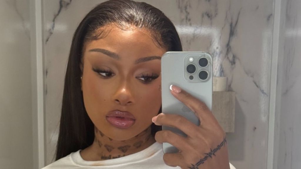 Megan Thee Stallion's Plunging Workout Top Gets Riskier With Every Inch