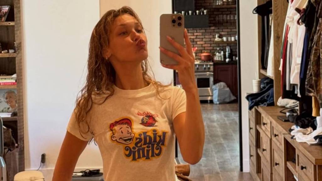 Bella Hadid Turns Heads in Chloe Lace Micro Minidress With Plunging Low Cut