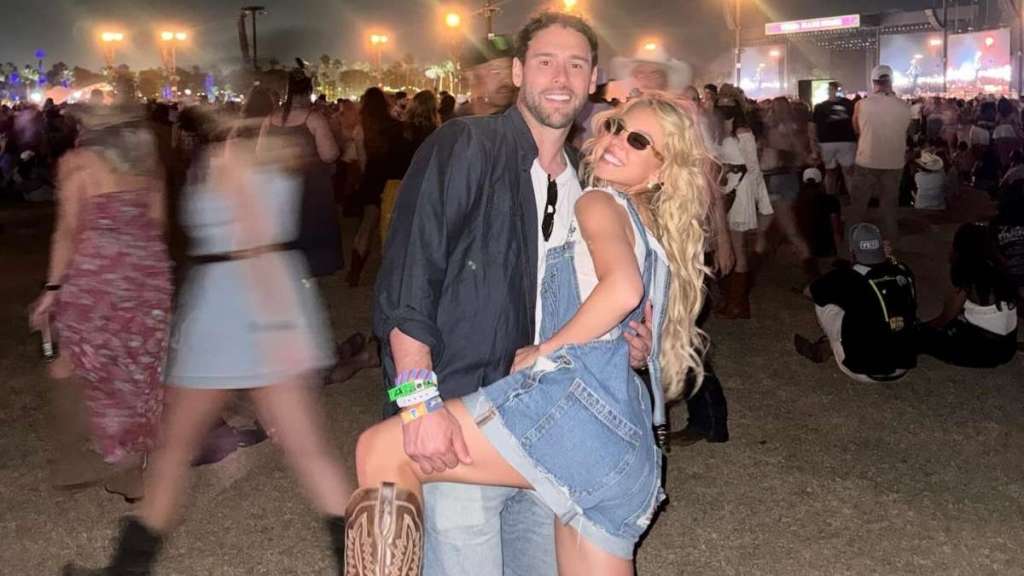 Sydney Sweeney Wraps Her Legs Around Scooter Braun & Kisses Him