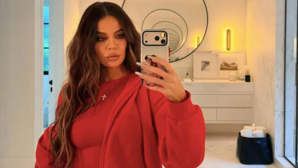 Khloe Kardashian Is Summer Ready in Dangerously Unbuttoned Top