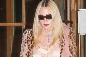Madonna's Saint Laurent Lace Romper Plunges Low & Rides High on Her Thighs