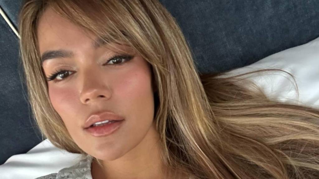Karol G's Skin-Baring Bikini Look Gets Unexpected Tropical Twist