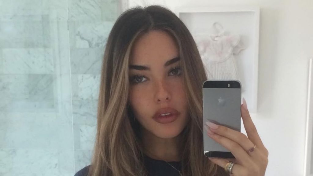 Madison Beer's Plunging Bodysuit Gets a Leg-Baring Sheer Twist