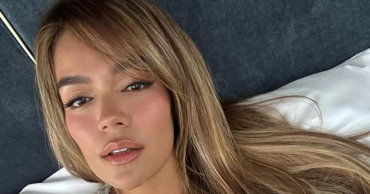 Karol G’s Zipped-Down Body-Hugging Top Leaves Very Little&hellip;