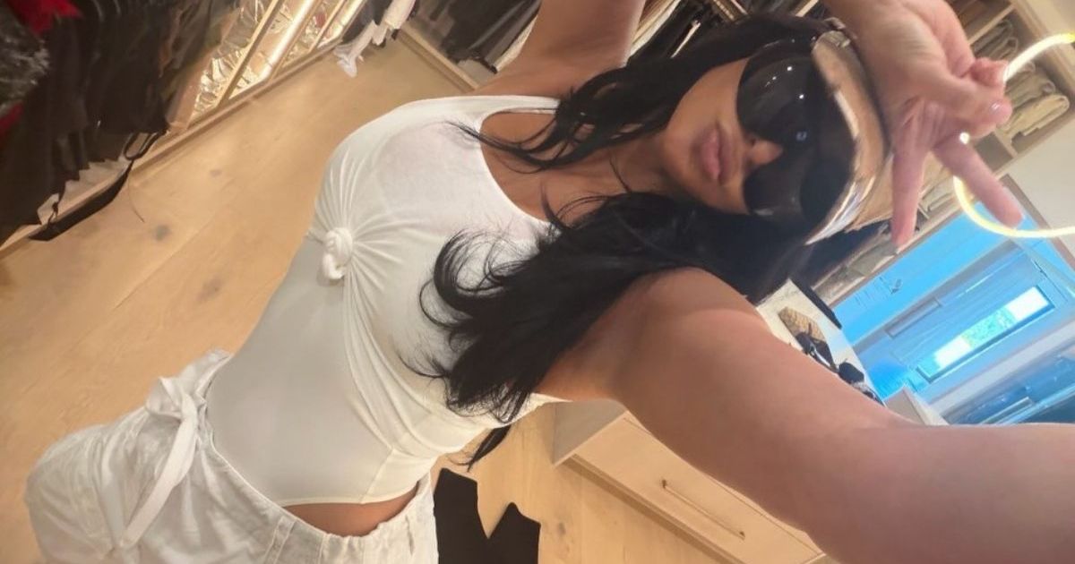 Kim Kardashian Caught Off Guard by Lewis Hamilton's Podium Shenanigans - Report