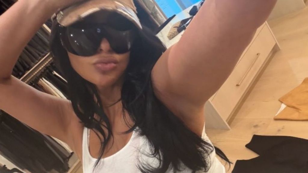Kim Kardashian Gives a Sneaky Thong Peek in Barely-Covered Bikini