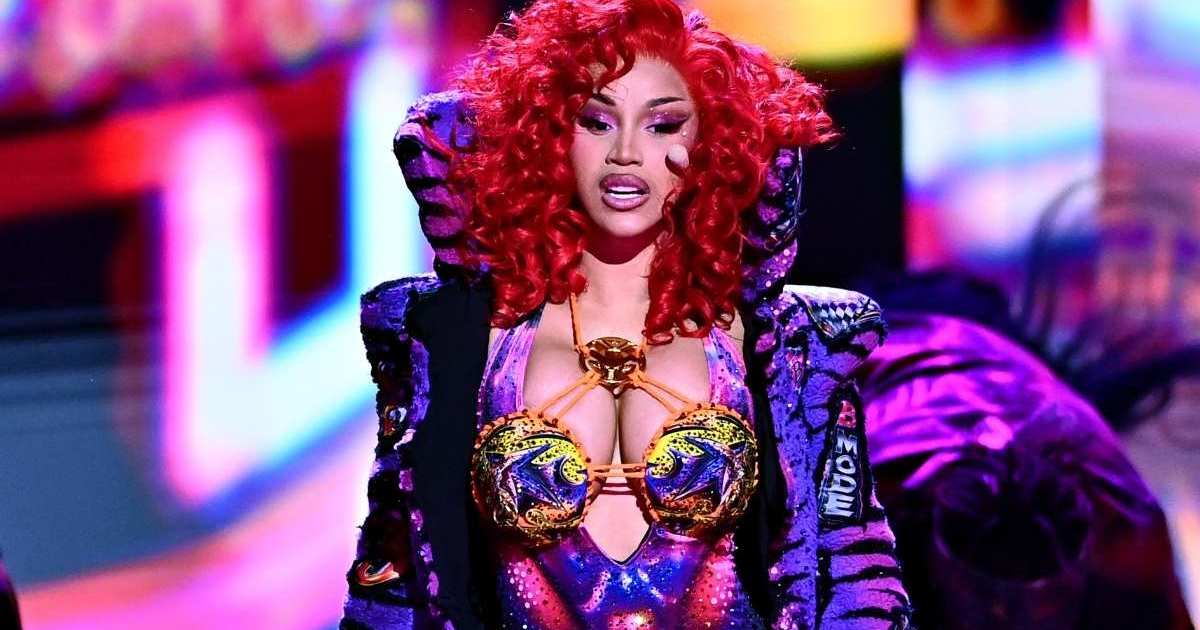 Cardi B’s Low-Cut Bodysuit Rides Dangerously High for Paris Fashion Week