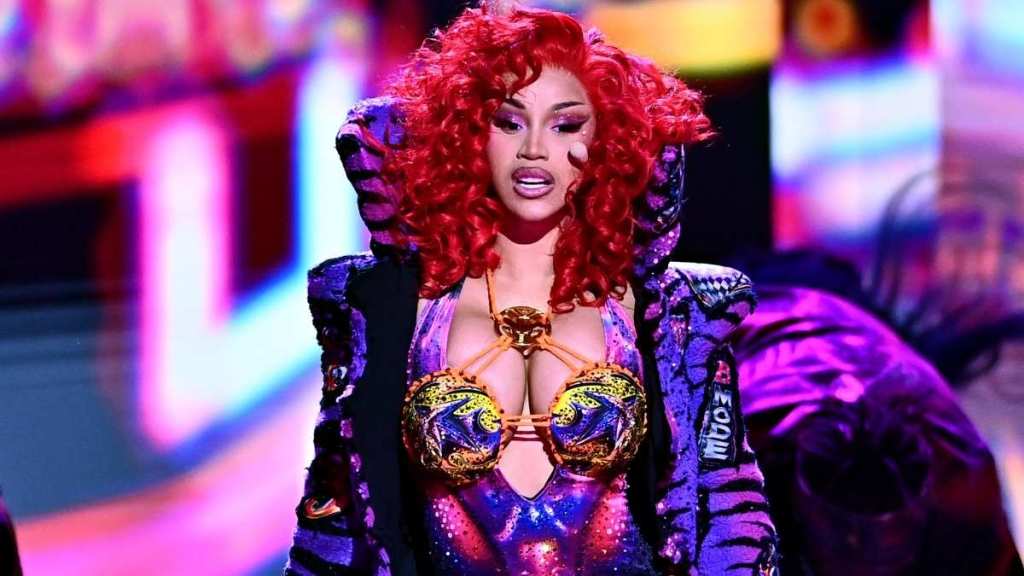 Cardi B’s Low-Cut Bodysuit Rides Dangerously High for Paris Fashion Week