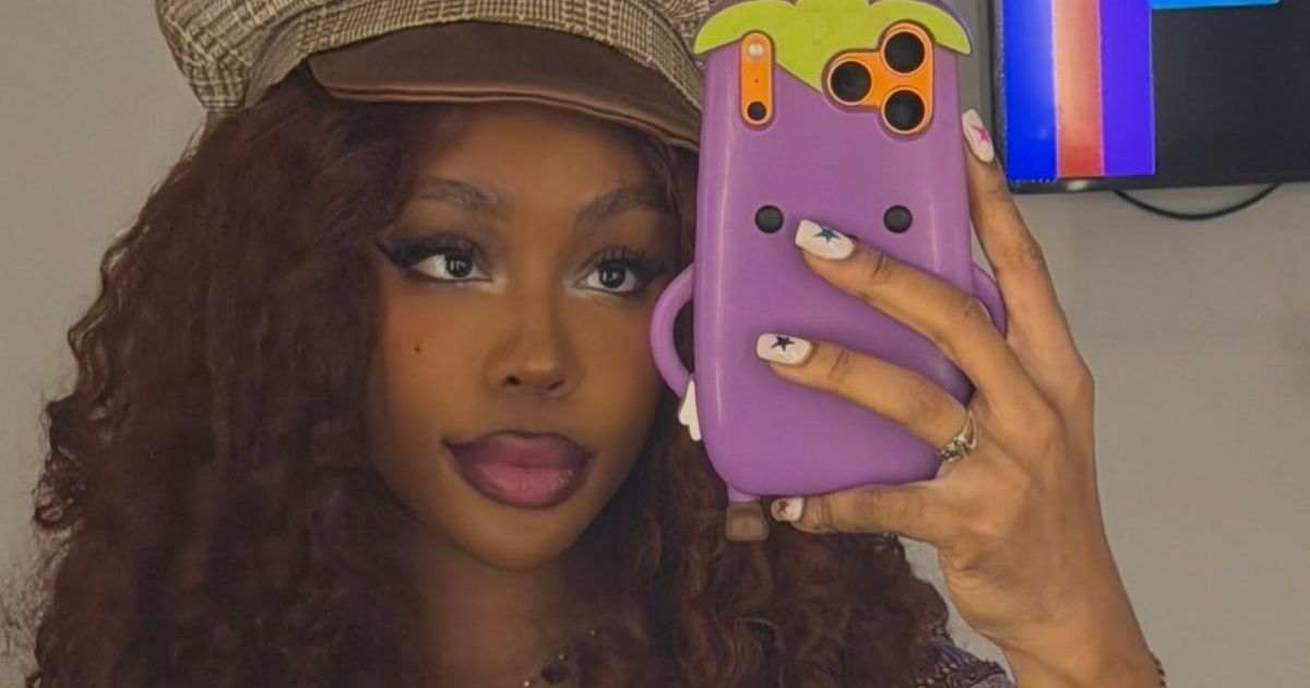 SZA’s Navel-Grazing Plunging Dress Leaves Very Little Covered
