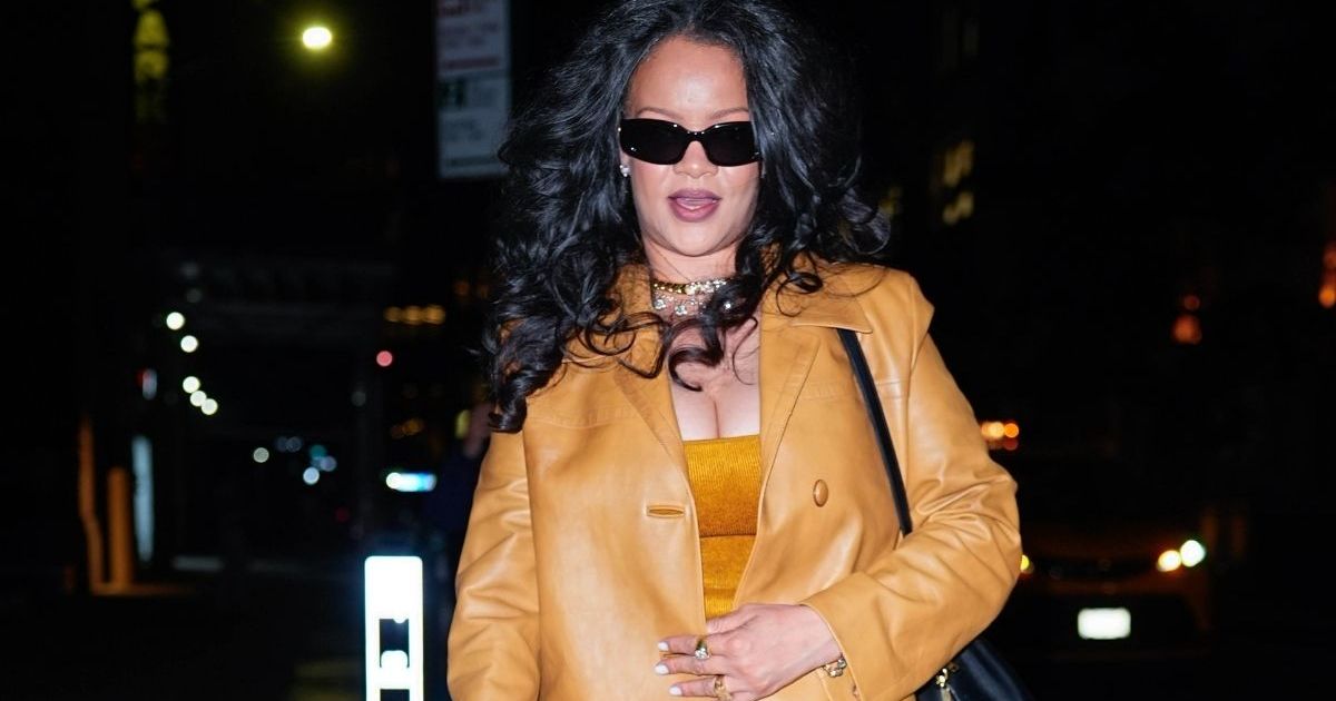 Rihanna's Savage x Fenty Lace Plunge Bra Peeks Through Unbuttoned Shirt