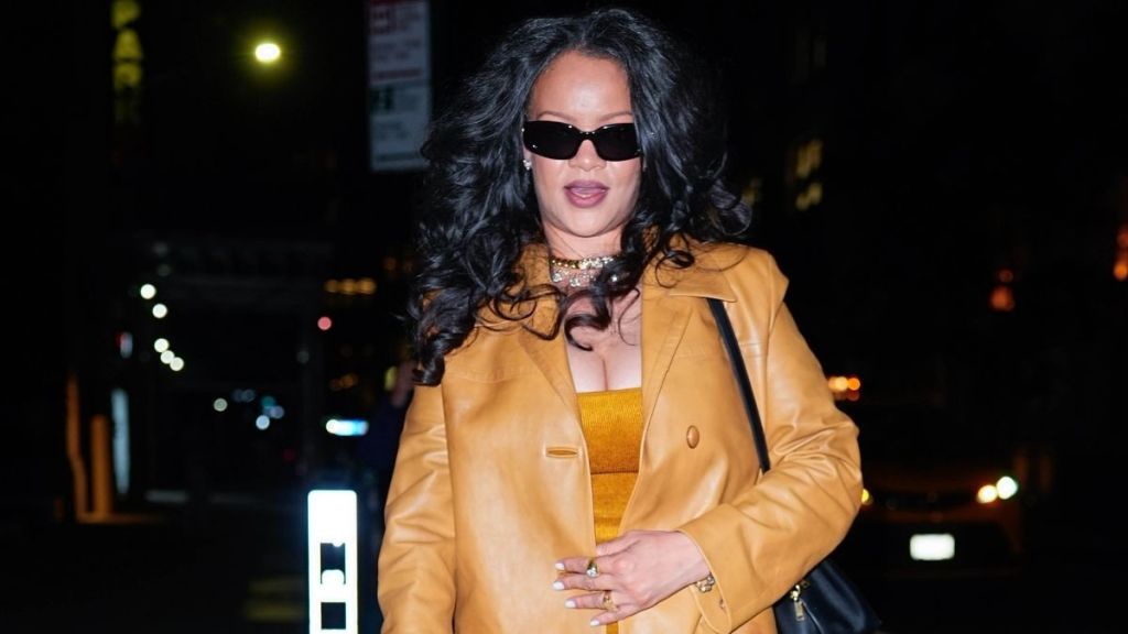 Rihanna's Savage x Fenty Lace Plunge Bra Peeks Through Unbuttoned Shirt