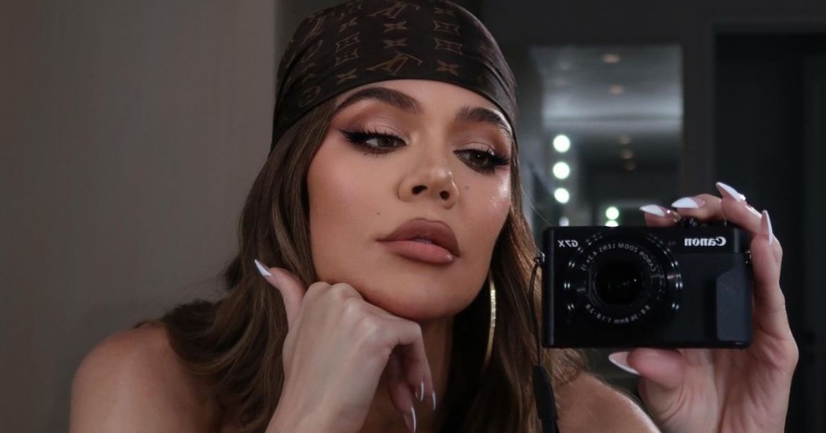 Khloe Kardashian Stuns in Wet See-Through Dress for Sultry XO Blue Shoot